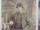 Civil War soldier posed in front of a backdrop in Philadelphia cdv photograph