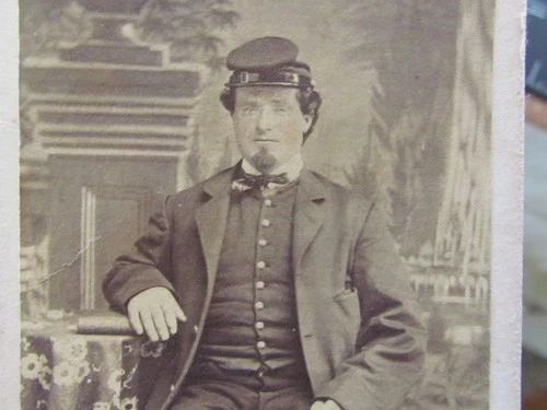 Civil War soldier posed in front of a backdrop in Philadelphia cdv photograph