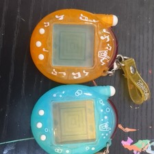 Tamagotchi Connection v3 Japanese Ketai Melon Soda and Orange Juice shells
