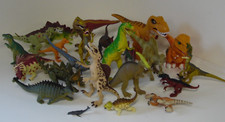 lot of toy dinosaurs assorted brands and sizes plastic