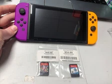 DW Nintendo Switch Console Only Games  Bundle Mario Kart 8 & Pokémon Sword Nice!