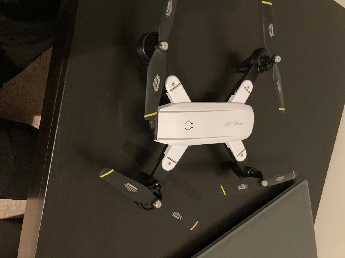 White SG 700D drone with Follow me mode hand control phone control