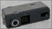 Minolta 16mm EE II with Rokkor 25mm f2.8 lens and zippered leather case