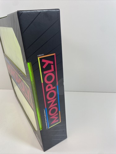 ¡Juego de mesa Monopoly Neon Pop!! Fichas de gato, t-rex, pato, coche, perro NUEVAS SELLADAS - Imagen 3 de 8
