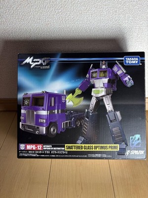 Transformers MPG-12 Shattered Glass Optimus Prime Figur Neuzustand