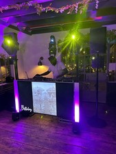 Off White DJ Booth With  65” Samsung 1080p Display