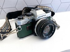 Olympus OM10 35mm SLR Film Camera w 50mm Lens /  NEW SEALS / Green Leatherette