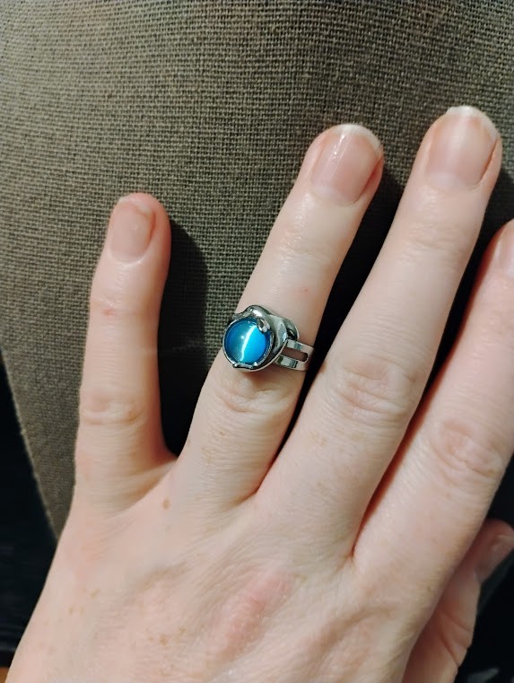Sizeable Blue stoned Dolphin ring - image 1