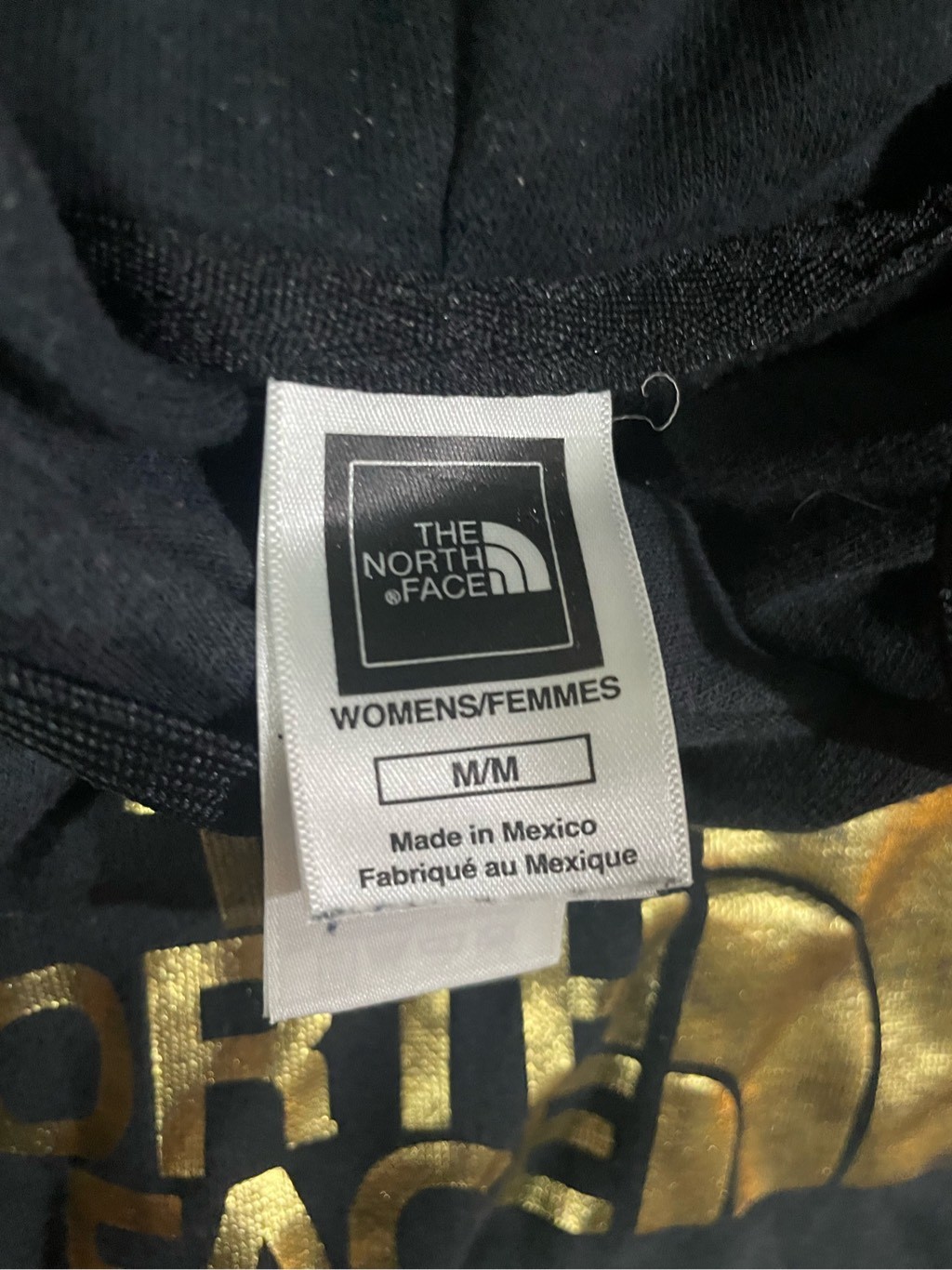 The North Face black hoodie with gold graphic size medium thumbnail 3