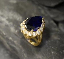 Lab-Created Blue Sapphire 3.Ct Pear Cut Halo Wedding Ring 14k Yellow Gold Plated