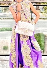 Party girls dress Purple and Gold trim size 10. It  s Very Stunning.