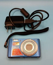 Works! Sanyo VPC E1600TP 14MP Digital Camera 5x Optical Zoom Blue + New SD Card