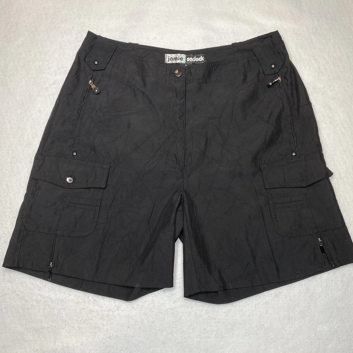 Mini-jupe style jupe-short Jamie Sadock Golf Vert noir Poches zippées