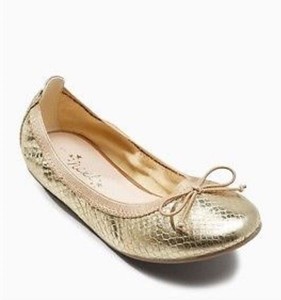 gold ballerinas