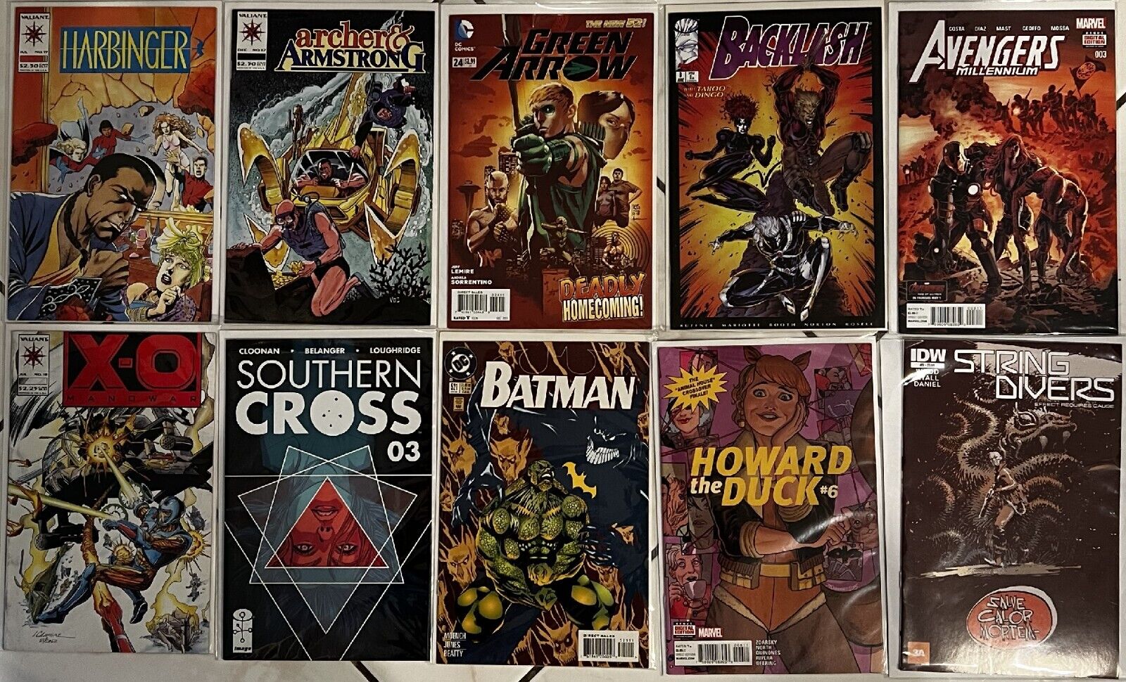 10 Comics Green Arrow Harbinger Batman X-O Manowar Backlash Howard Duck and More