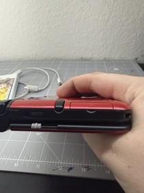 Nintendo 3ds Xl Red Used. Comes with Stylus, 4gb Sd Card, and Charging Cable.