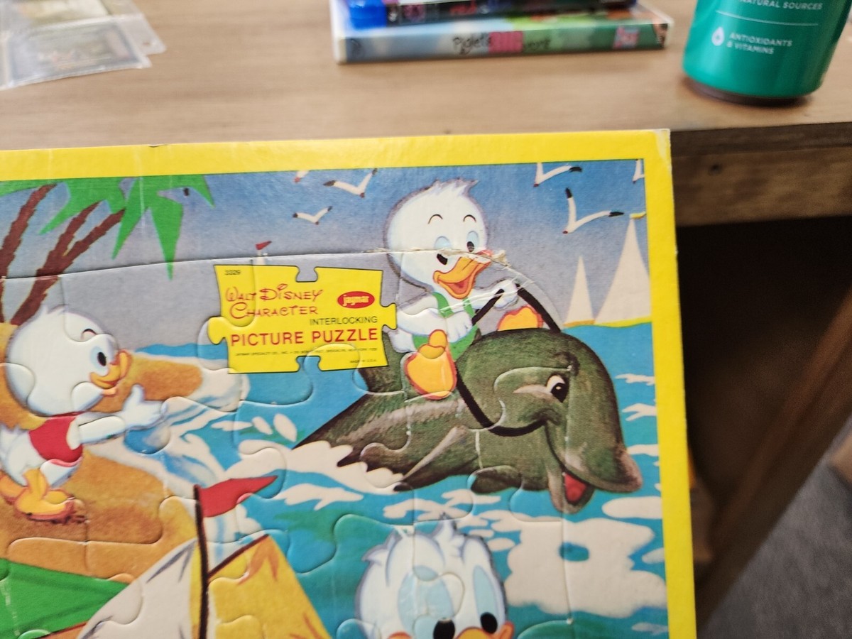 Vintage Walt Disney Children's Puzzle Donald Duck family sea shore