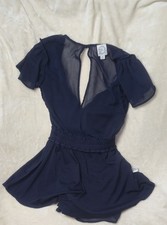 Blue Rain Romper XS Black Ruffled Gently Used And In Excellent Condition 