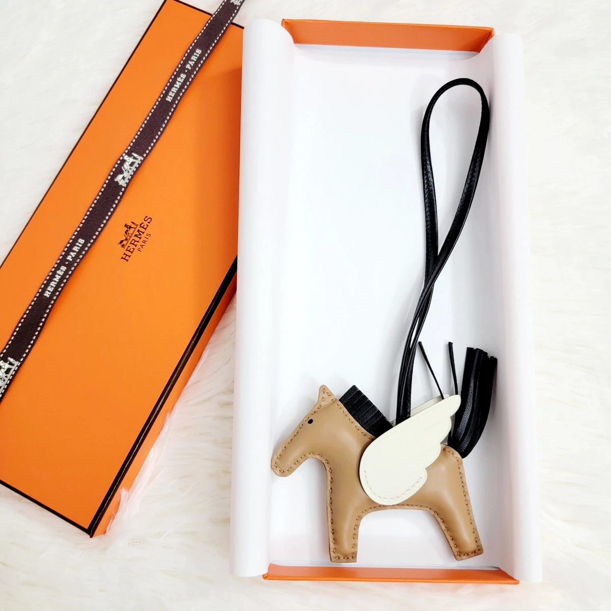 hermes bag with horse charm