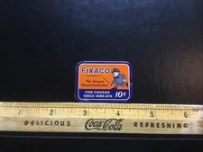 Vintage Fixaco For Coughs Medicine Drug Store Advertising Tin.