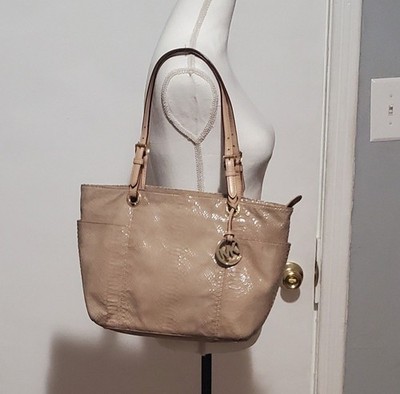 Michael Kors tan embossed purse handbag