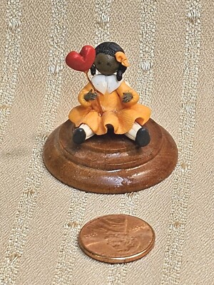 VINTAGE ARTISAN MADE MINIATURE LITTLE GIRL WITH RED BALLOON ON WOODEN BASE 