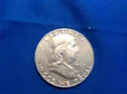 1963-D Franklin Half Dollar (yellow-orange/yellow)