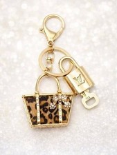 Authentic Louis Vuitton Gold Padlock Key Set w/ Unbranded Leopard Bag Charm