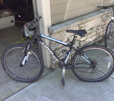 black and blue trek mountain bike Off 