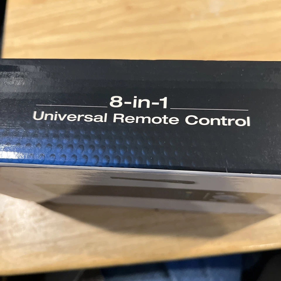 SHARPER IMAGE UNIVERSAL REMOTE CONTROL 8 IN 1 BRAND NEW IN UNOPENED BOX - Image 3 of 4