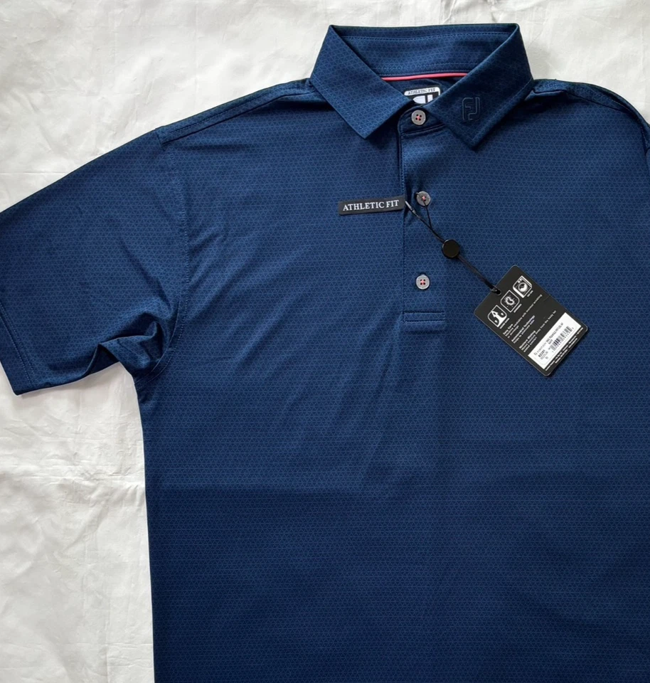 Camisa polo de golf Footjoy para hombre estampado triángulo azul marino parche en el brazo talla M Foto 2 de 4