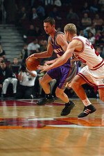 Dan Langhi Phoenix Suns is covered by Fred Hoiberg Chicago Bulls - 2002 Photo