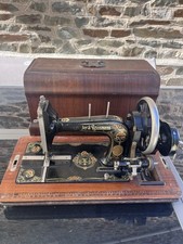 Pfister & Rossmann machine à coudre mécanique à manivelle avec mallette bois