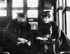 Tram driver and woman conductor having lunch break at the terminal Old Photo