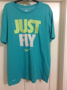 camiseta nike turquesa