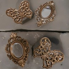 Lot de 4 produits Burwood ton or 2 papillons 2 miroirs ovales