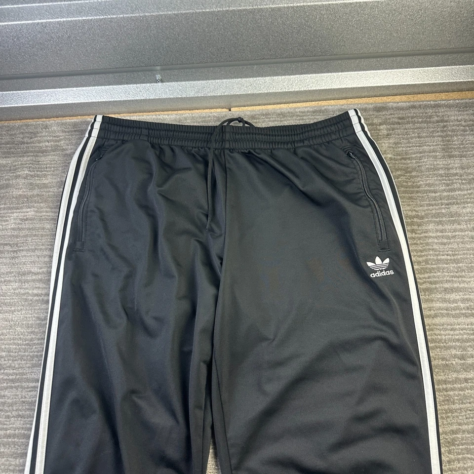 Pantalones deportivos Adidas para hombre 2XL XXL negros Firebird Foto 3 de 4