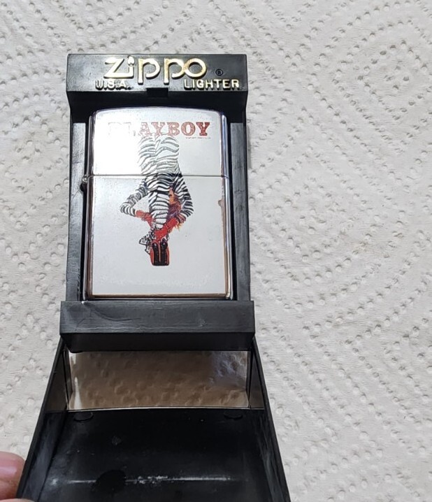 Zippo Playboy zebra print 03 with original case non working condition B10
