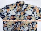 Navy blue Hawaiian shirt mens 2XL with orange, yellow, and blue floral print and green leaf pattern, made in USA.
