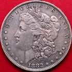 1882-O/S OVER MINT MARK MORGAN DOLLAR