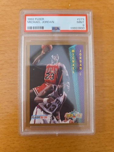 1992 Fleer #273 Michael Jordan "Slam Dunk" trading card, graded PSA 9 Mint.