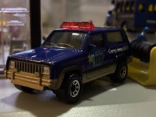 Vintage Matchbox Jeep Cherokee Camp Jeep 2000 Diecast Car Blue Collectible Vintage Matchbox Jeep Cherokee Camp Jeep 2000 Diecast Car Blue Collectible