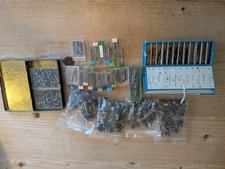 Large job lot of pocket watch stems, sleeves, and crowns