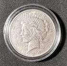 1934-D Peace Dollar Circulated 90% Silver - Album Coin in Capsule