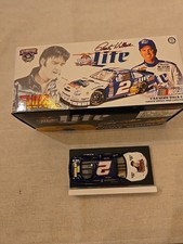 ACTION RUSTY WALLACE MILLER / ELVIS  1998  2 FORD TAURUS BANK 1:64