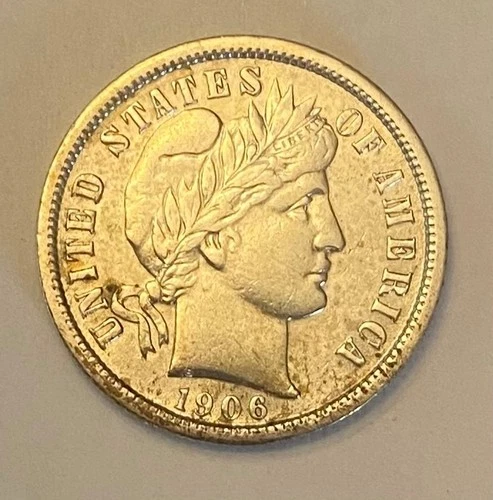 1906 Barber dime Au nice coin with a little album toning