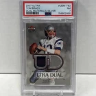2007 FLEER ULTRA TOM BRADY DUAL MATERIALS SILVER /199 - PSA 7