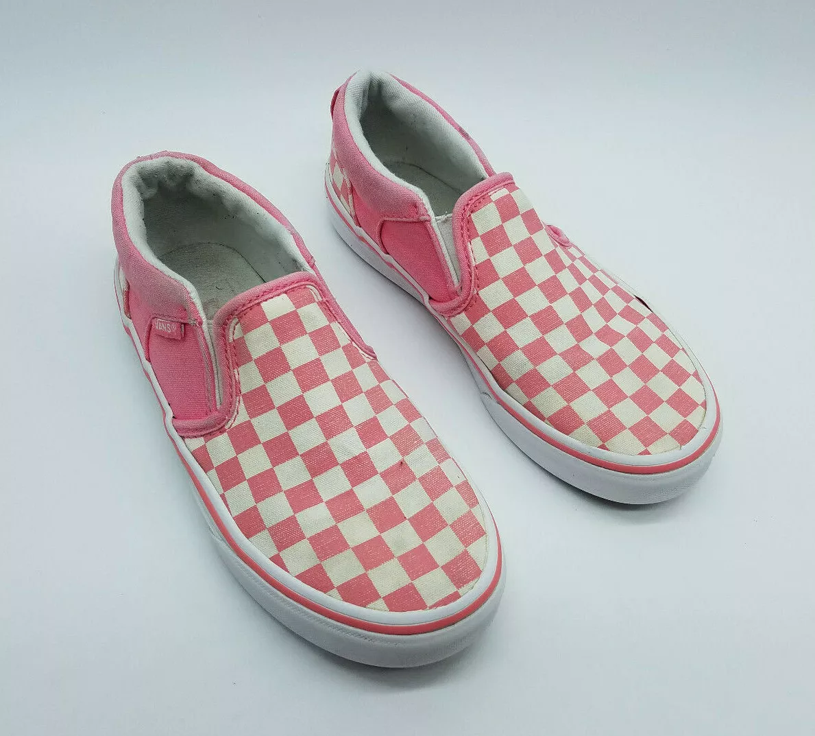 Vans slip ons cheap pink and white