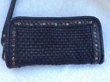 Black Leather Wallet or Wristlet. Zipper closure twelve card slots. NEW