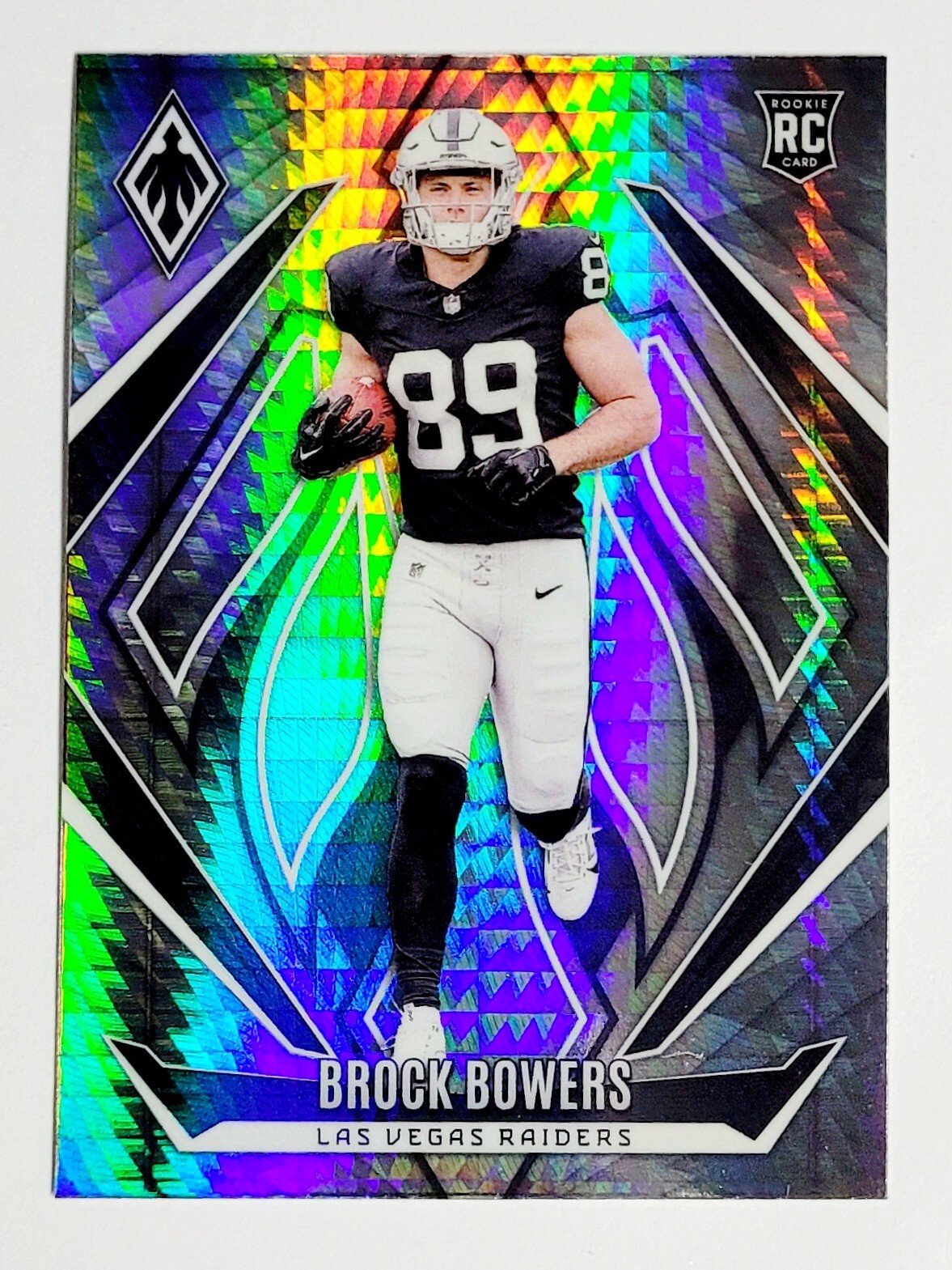 2024 Panini Phoenix Brock Bowers RC Hyper Rookie Card #165 Las Vegas Raiders
